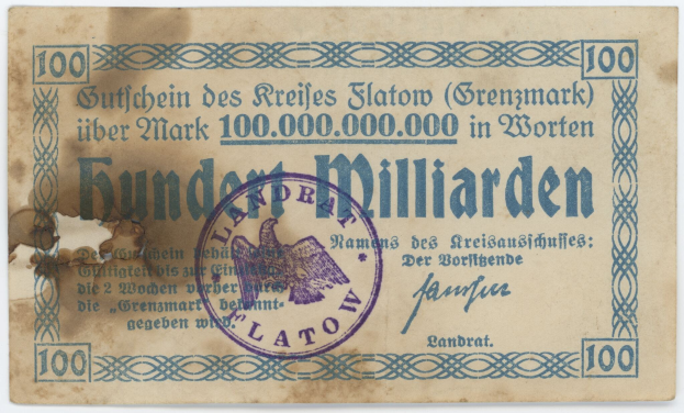 Alte deutsche Banknote mit "Grenzmark 100.000.000"-Text und einem violetten Stempel auf einem weißen Hintergrund.